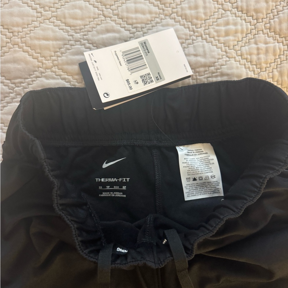 NIKE Women's Therma-FIT Essential Running Pants - Picture 14 of 14